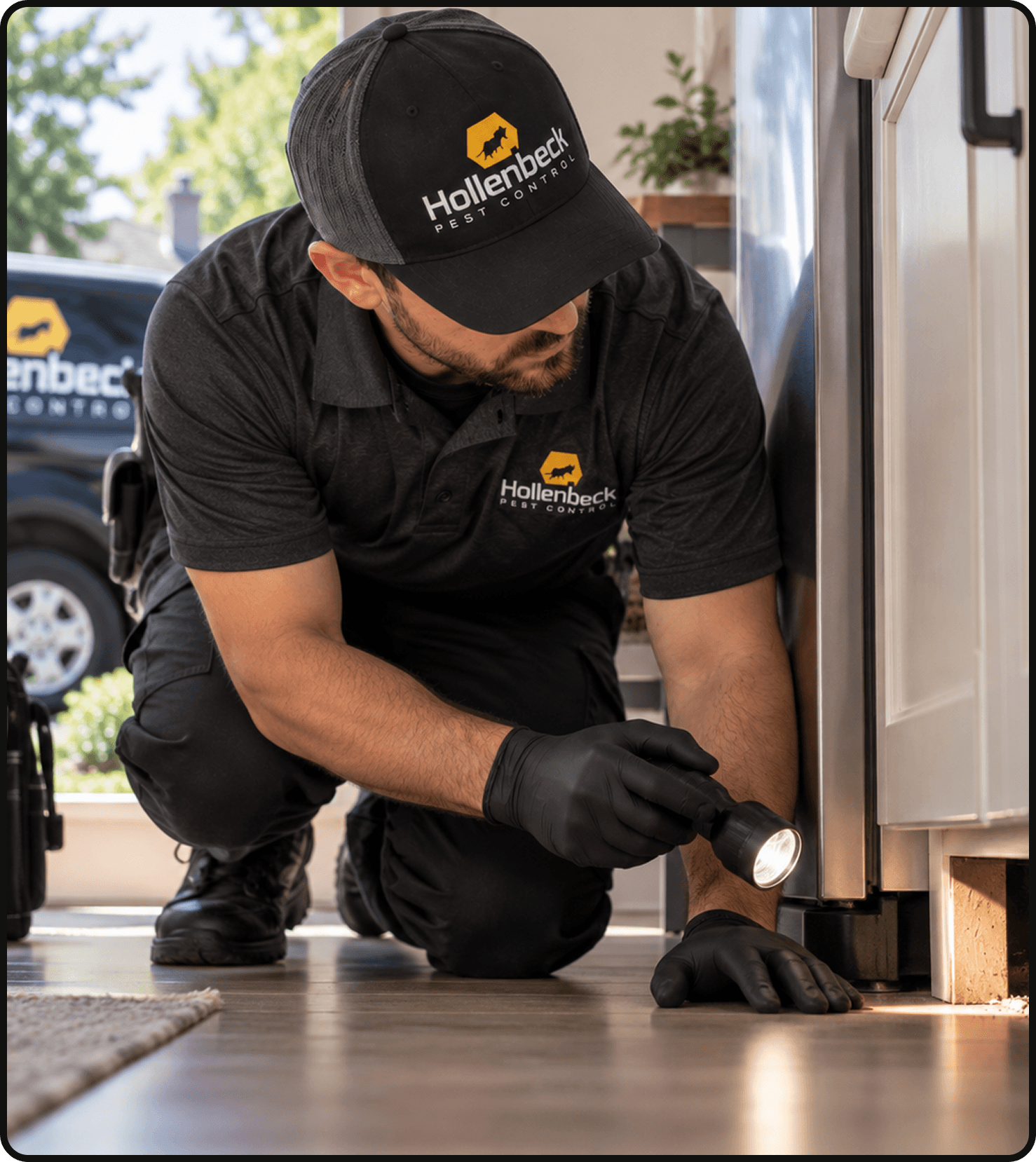 Hollenbeck Pest Control technician inspecting a home for signs of rodents