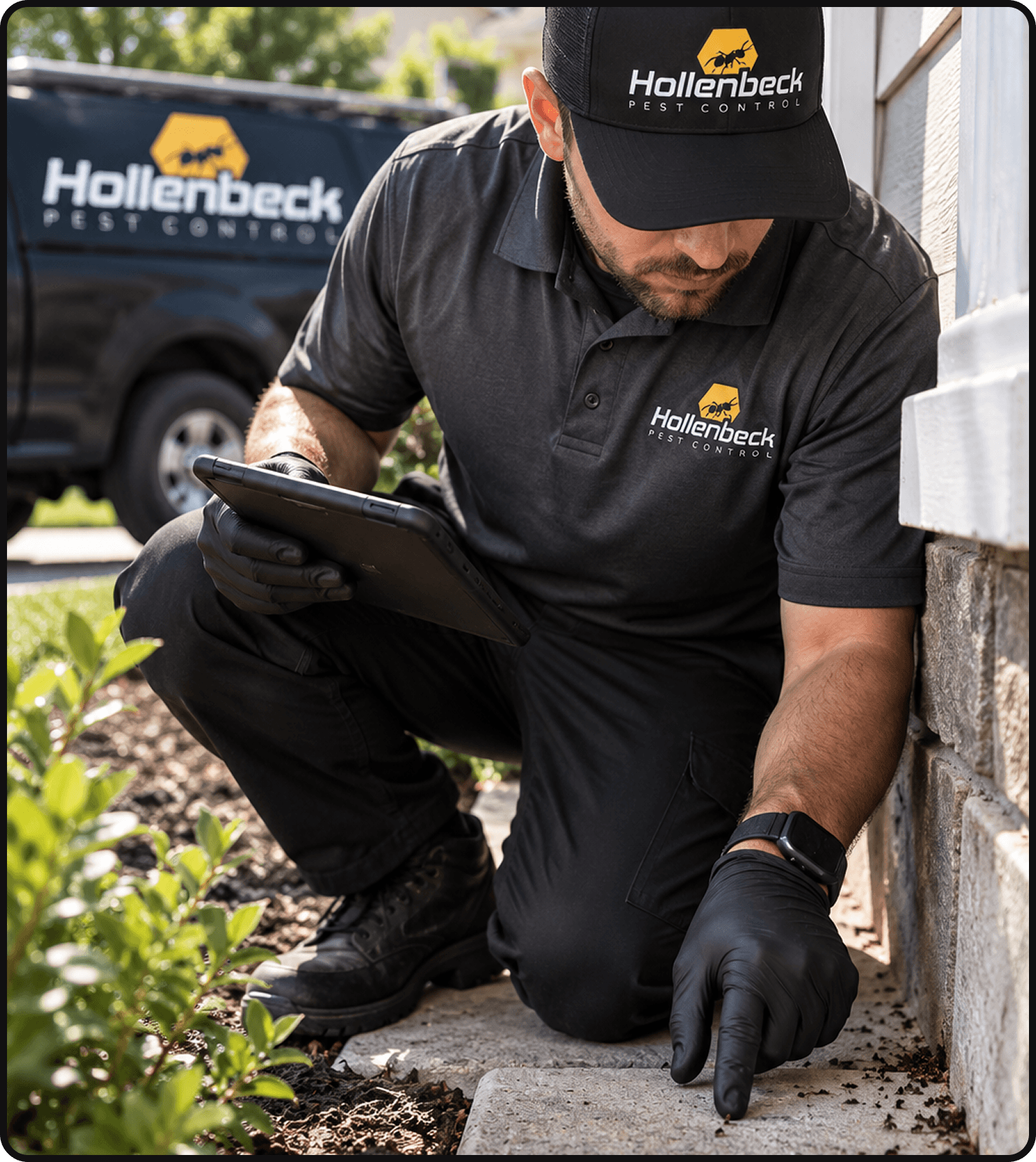 Hollenbeck Pest Control technician inspecting a residential property for pests